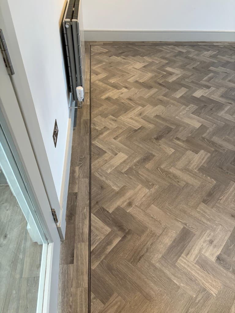 Precision mitered border and feature strip detailing — Parfait Flooring, Glasgow