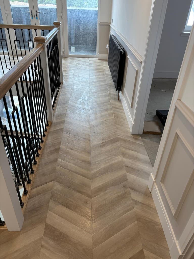 Precision mitered border and feature strip detailing — Parfait Flooring, Glasgow