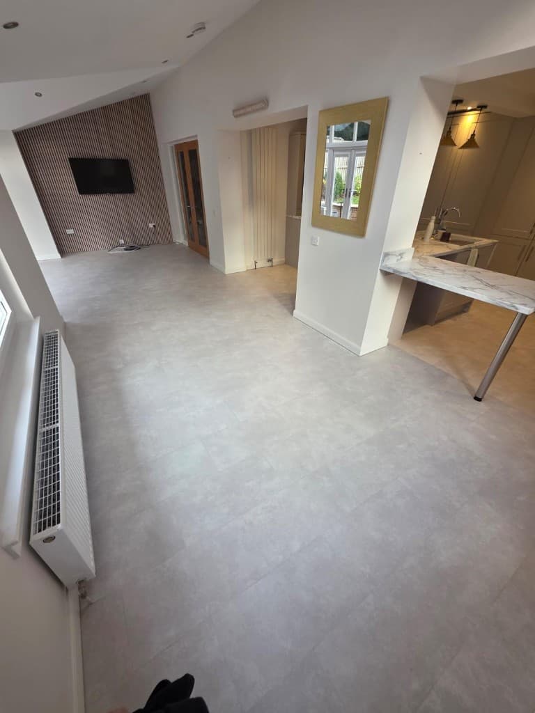Herringbone LVT flooring installation with custom border — Parfait Flooring, Glasgow