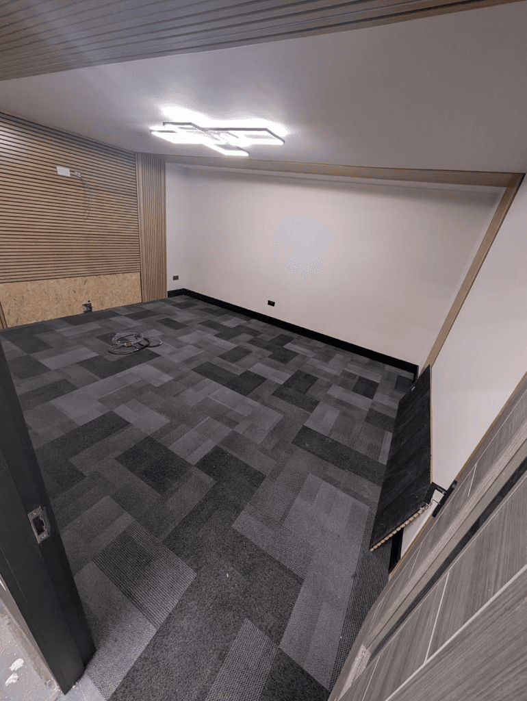 Grey textured carpet tiles in a modern commercial office — Parfait Flooring, Glasgow