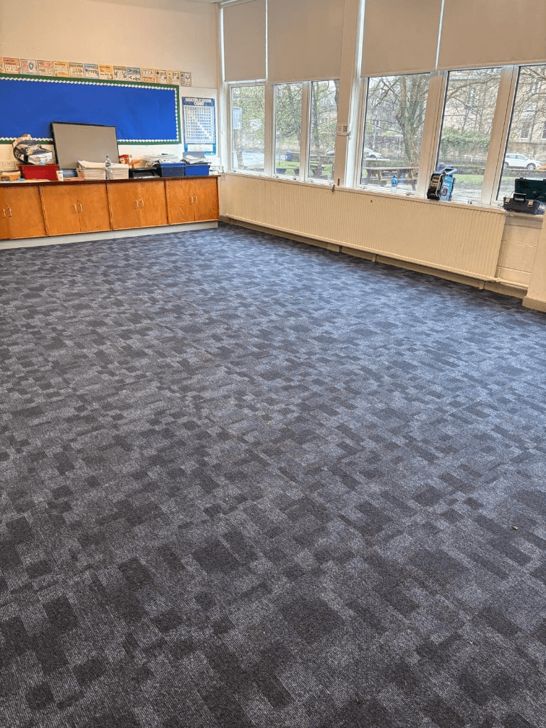 Carpet tiles in a bright school classroom with storage units — Parfait Flooring, Glasgow